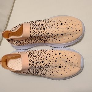 Pink slip on sneakers